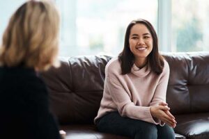 behavioral health specialist explaining the benefits of Sublocade treatment to young woman